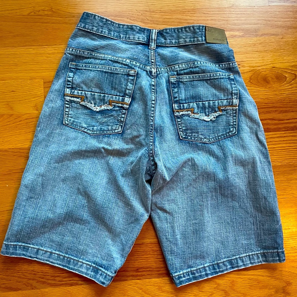 Distressed flypaper denim shorts